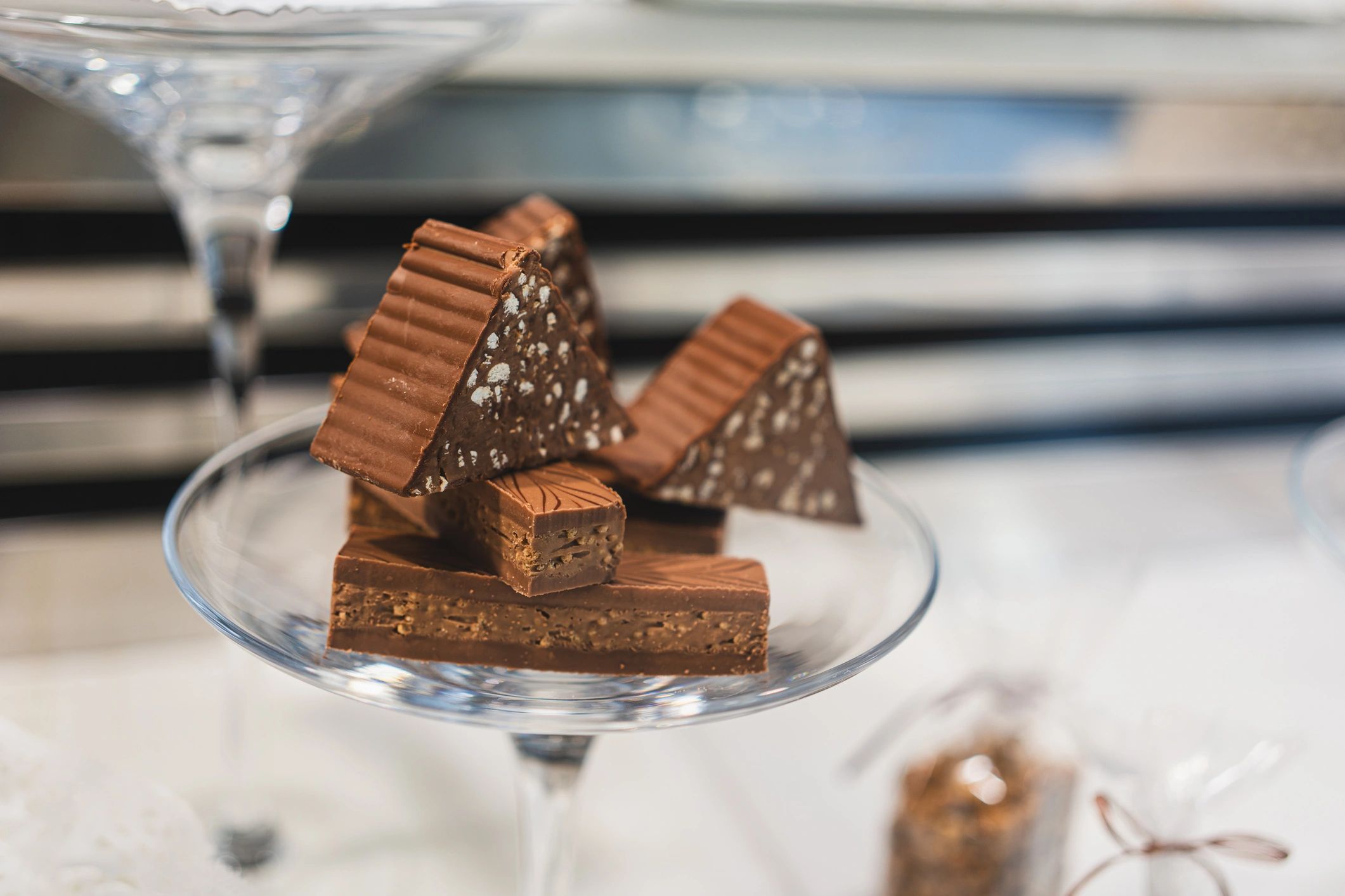 Close-up of a display of gourmet chocolates arranged