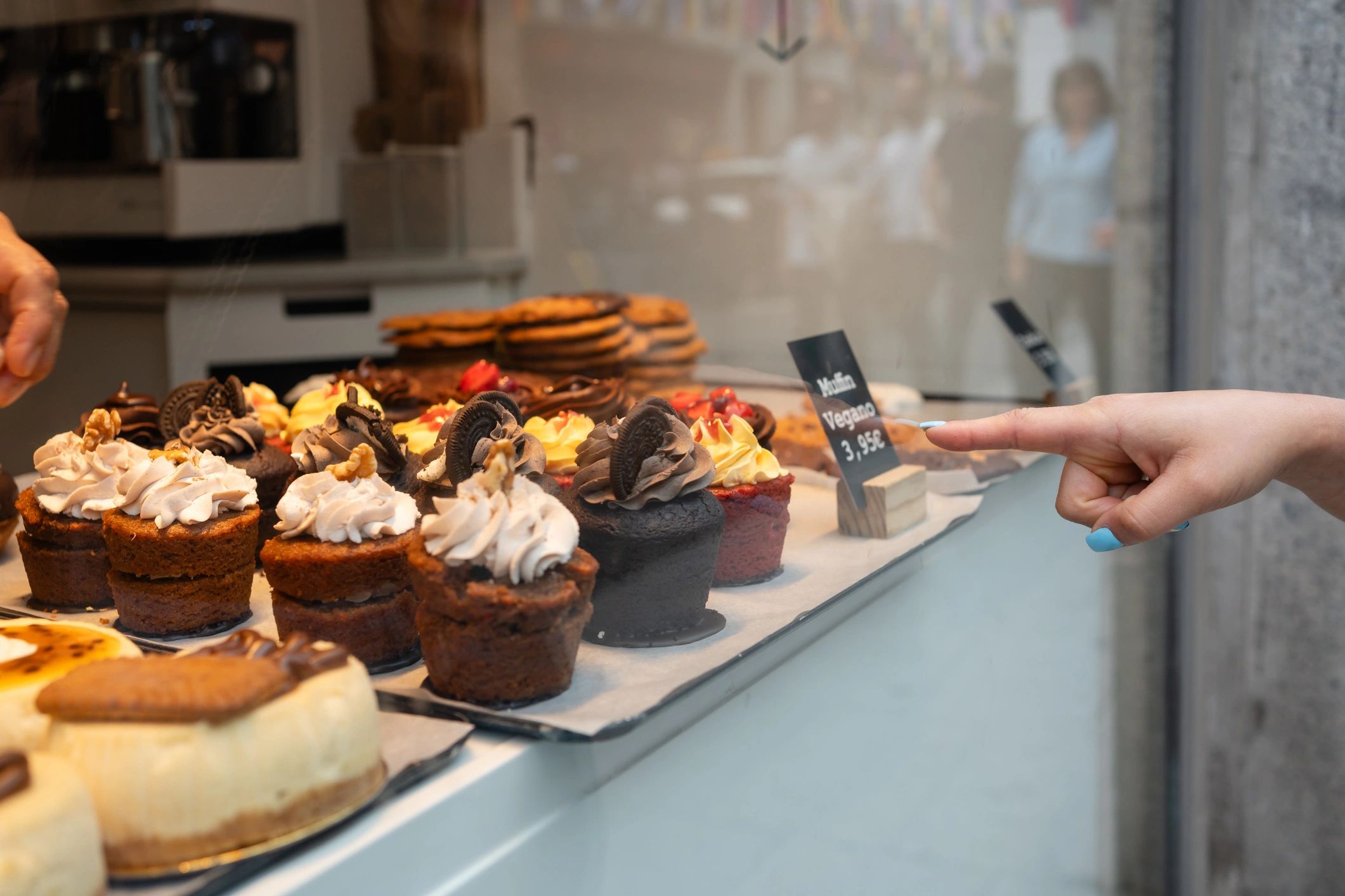 Variety of delicious cupcakes are displayed in a